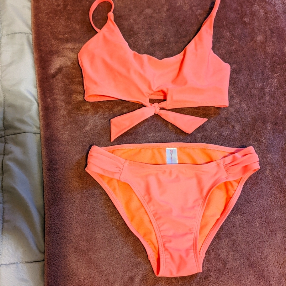 NWOT. Coral size small swim suit. Two peice bikini. Never worn but no tags.
